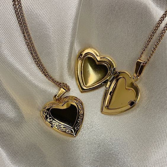 gold heart necklace with photo inside