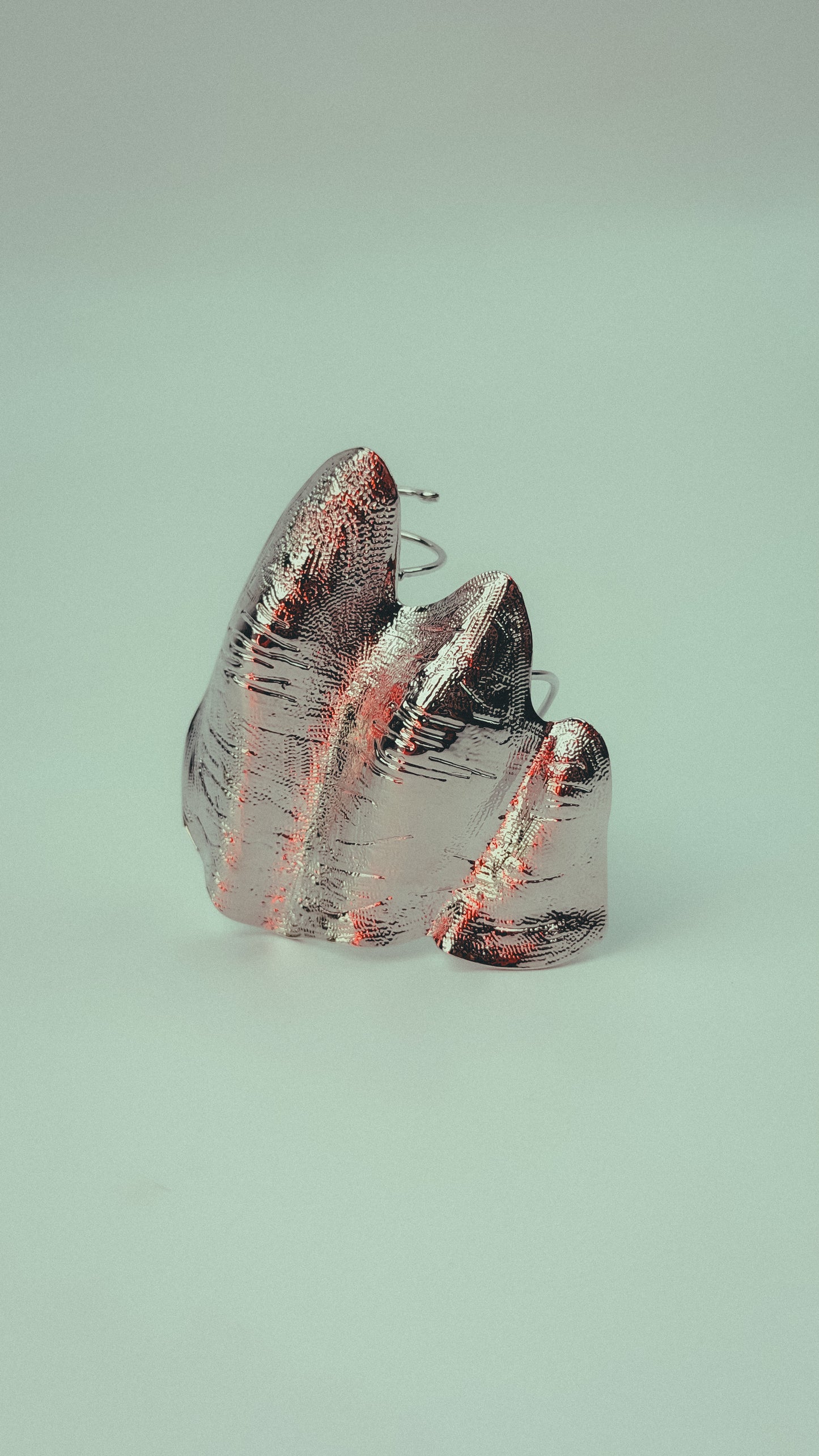 Asymmetrical Pleated Joint Ring