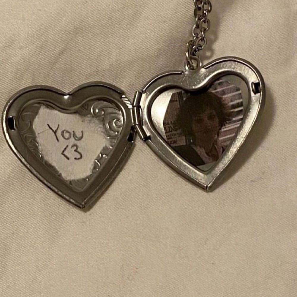 silver heart necklace with photo inside