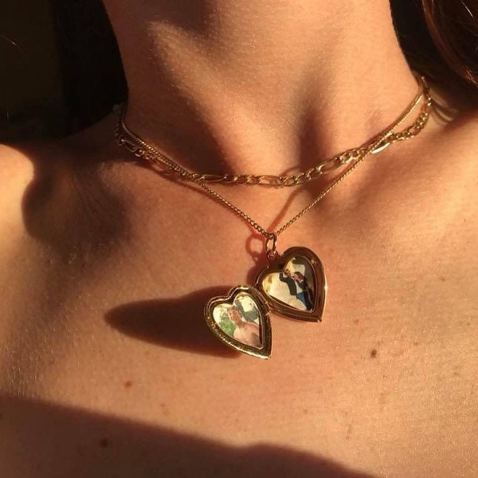 ‏gold heart necklace with photo inside