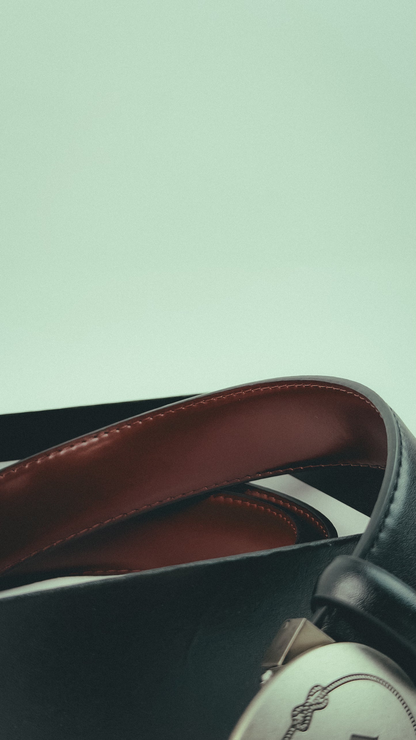 Prada Black Leather Belt with Engraved Oval Plaque Buckle