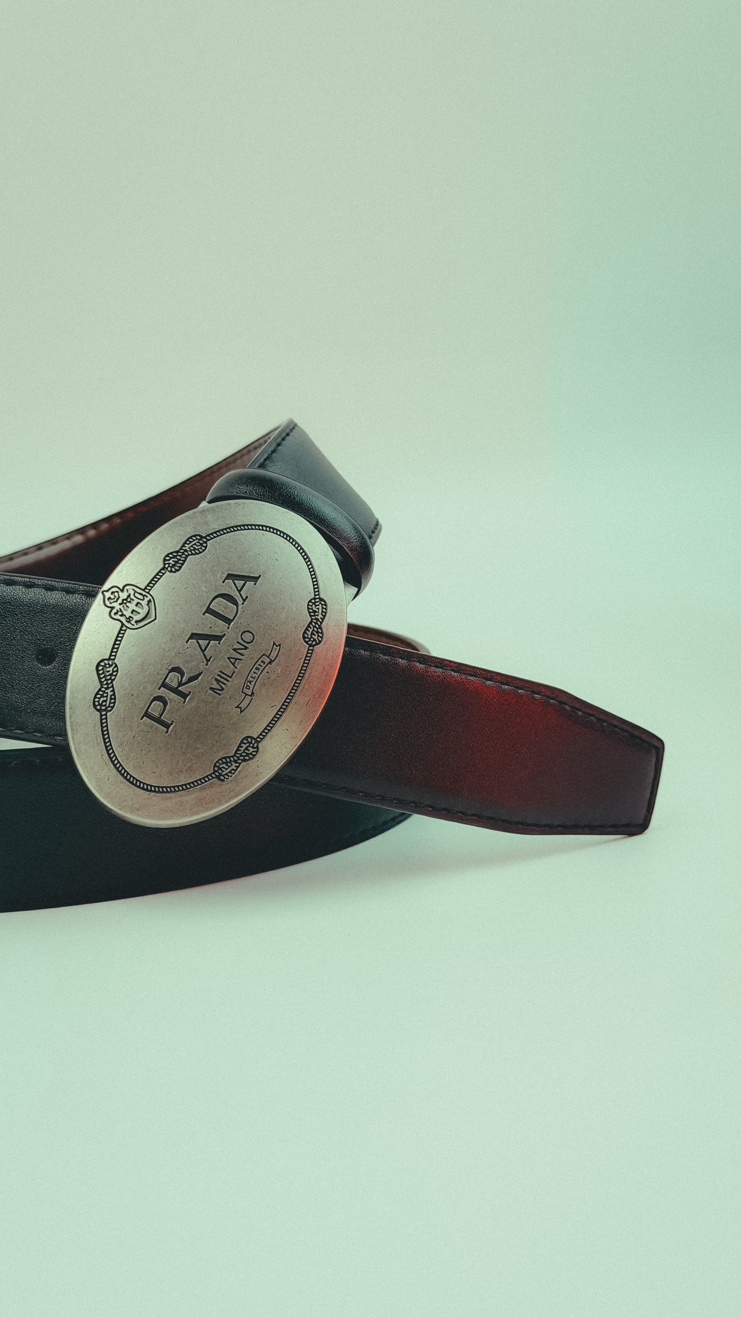 Prada Black Leather Belt with Engraved Oval Plaque Buckle