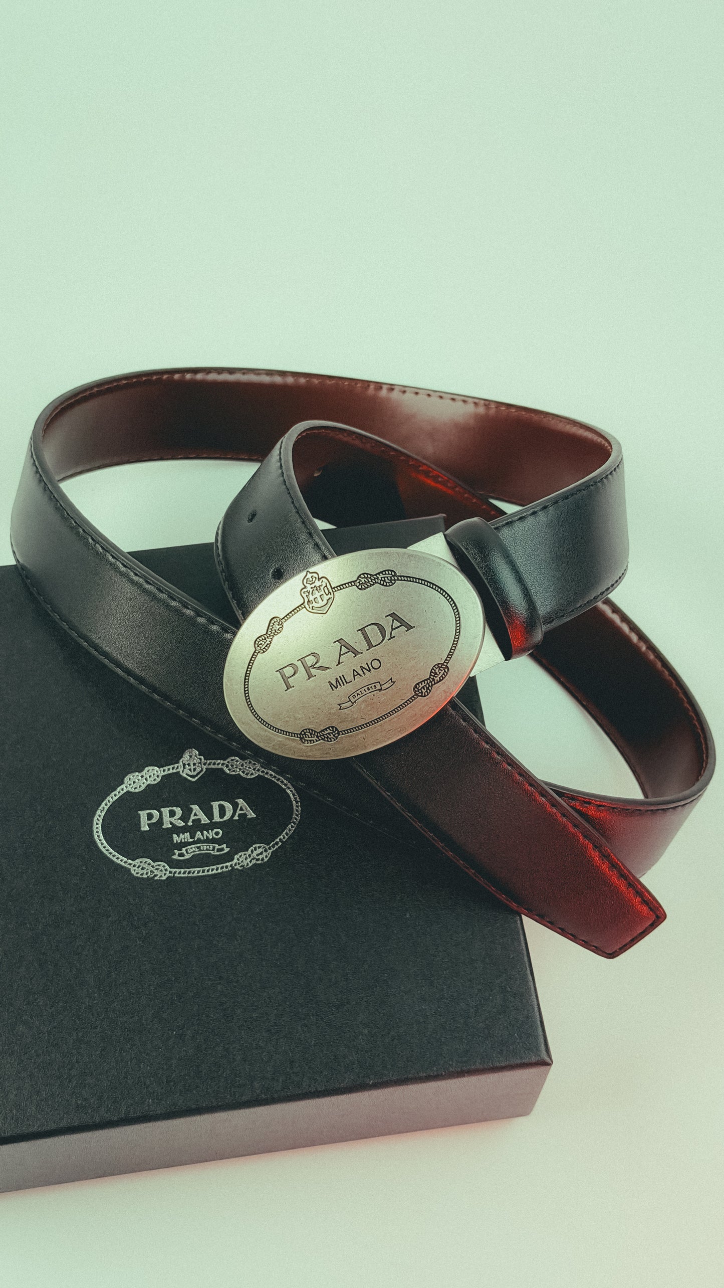 Prada Black Leather Belt with Engraved Oval Plaque Buckle