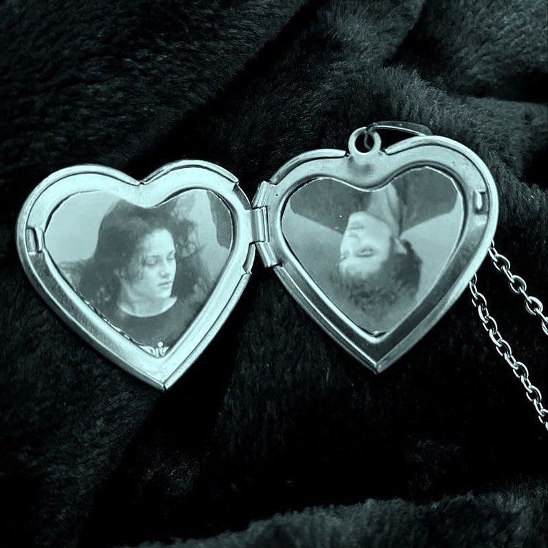 ‏silver heart necklace with photo inside