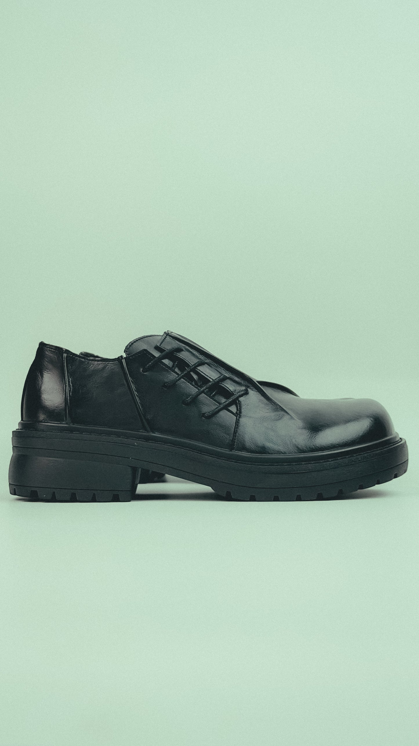 Black Low-Top Derby Shots